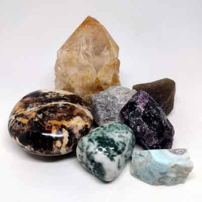 New crystals at Seeds of Wellness - candle quartz, black opal, larimar, and raw gemstones